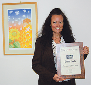 Jan Orrett, Sales & Marketing Manager, accepts the Award from our journalist